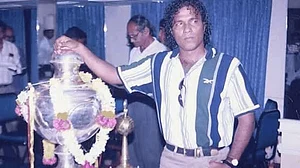 Bruno Coutinho with the Federation Cup trophy in 1997