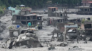Houses lie in ruins following devastating floods in Bidur, Nepal.