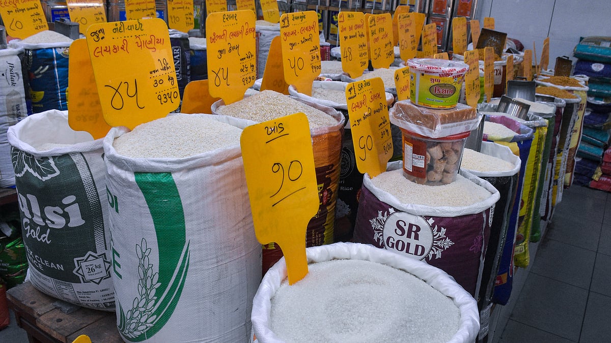 Sugar is displayed for sale at a grocery store amid rising prices in Surat.