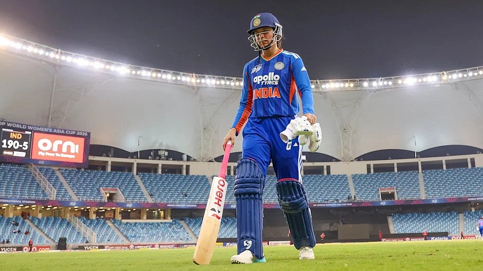 Smriti Mandhana walks back after he century on Thursday