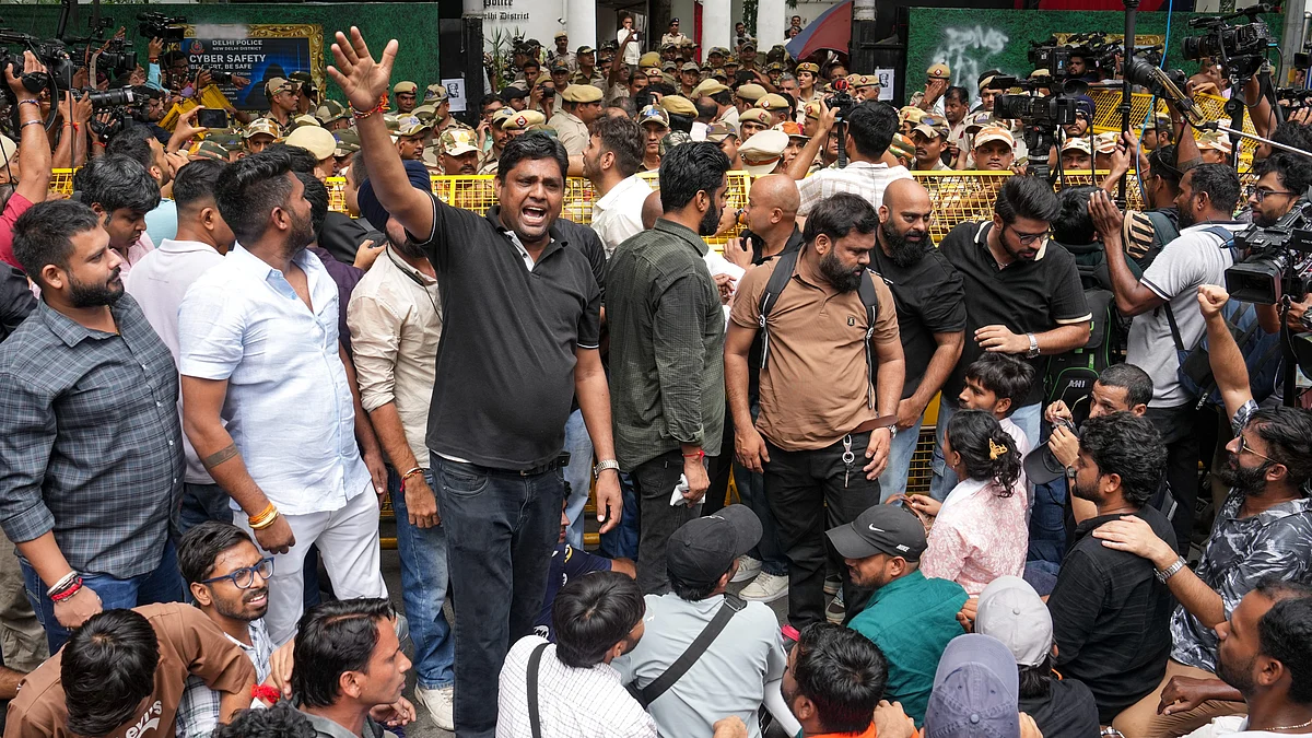 CJP supporters stage a protest outside Parliament Street police station in New Delhi.