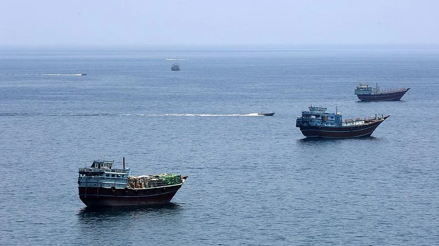 Vessels sail through the Strait of Hormuz amid rising tensions.