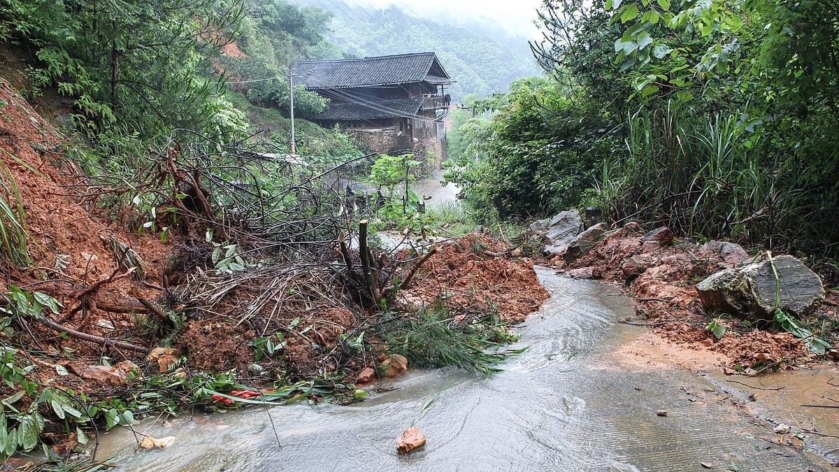 Road blocked by mud and stones after heavy rain in Hunan, China.