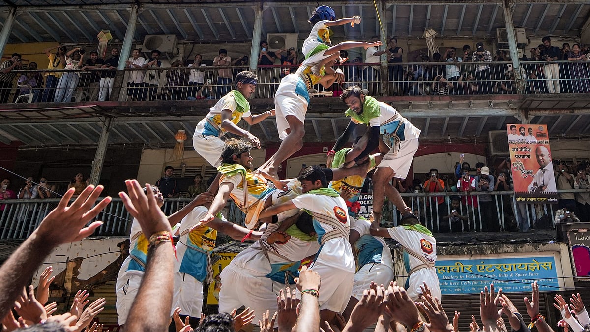Govinda Pathaks form a human pyramid during a Dahi Handi event in Mumbai’s Dadar.