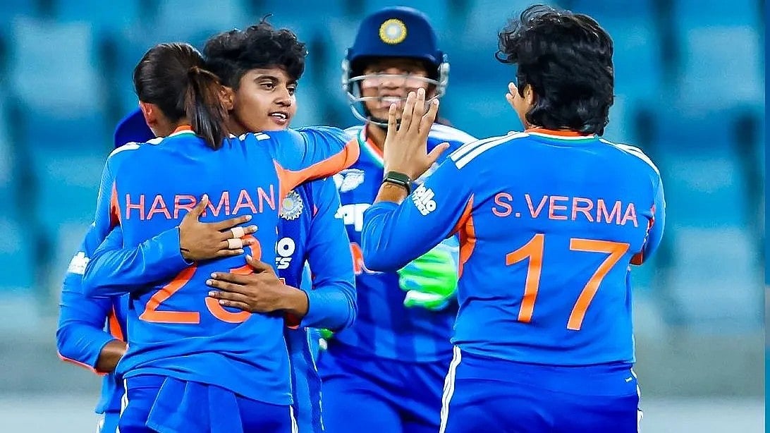 N. Sree Charani, Player of the Match, being congratulated after one of her wickets