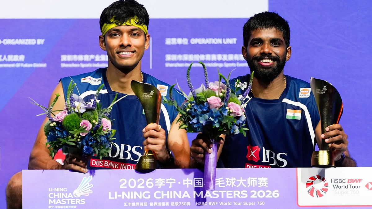 Chirag Shetty (L) and Satwik Rankireddy after their win