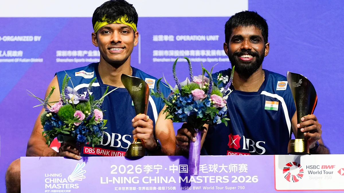 Chirag Shetty (L) and Satwik Rankireddy after their win