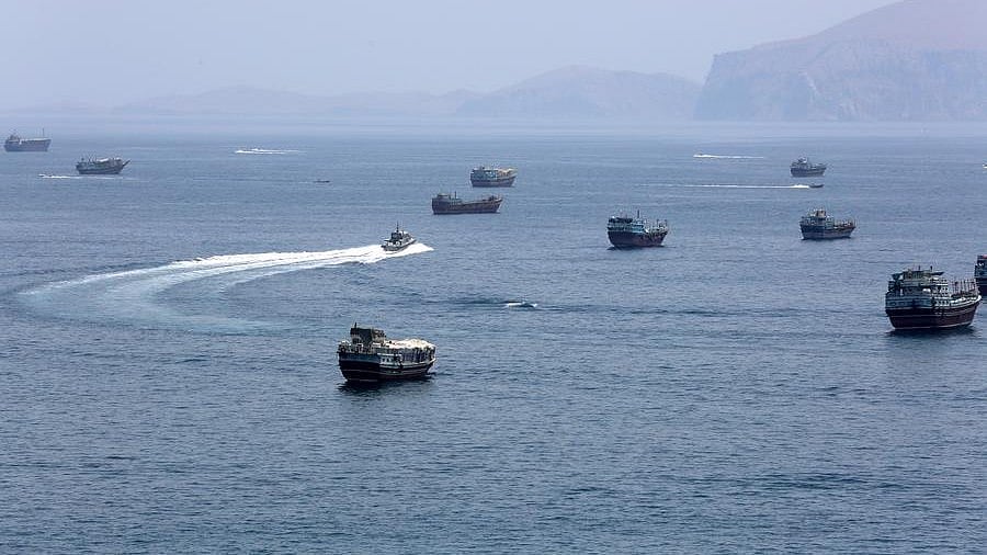 Vessels navigate the Strait of Hormuz amid heightened tensions.