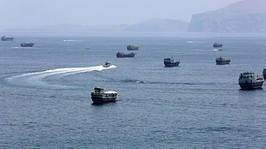 Vessels navigate the Strait of Hormuz amid heightened tensions.