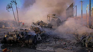 Firefighters at scene after tanker crash near Sanandaj, Iran on 5 September.