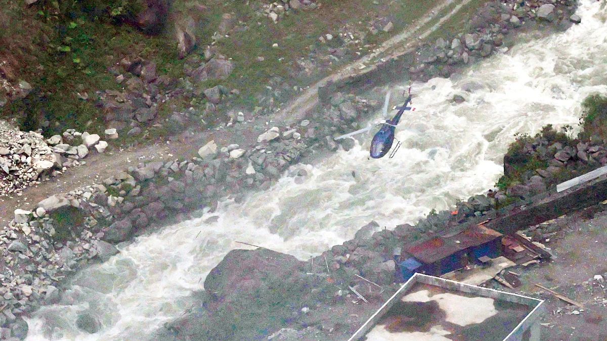 Helicopter takes off from the Upper Trishuli-1 hydropower site in Nepal’s Rasuwa district.