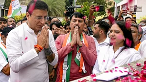 Randeep Singh Surjewala arrives in Ahmedabad.