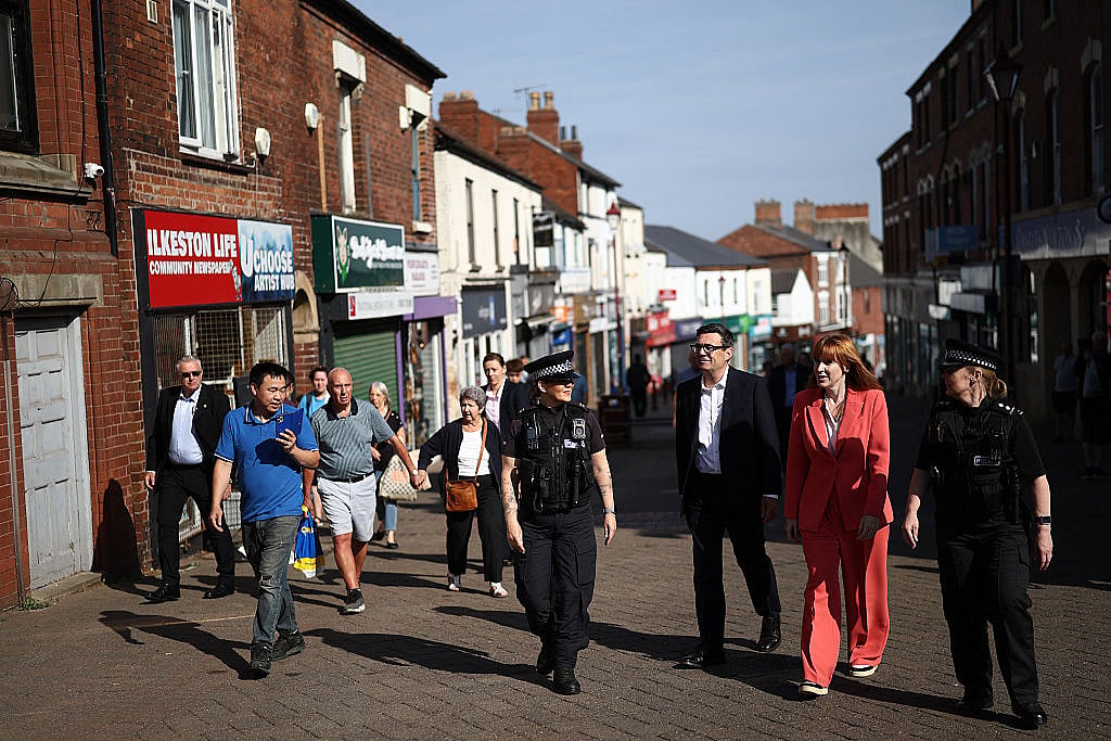 PM Andy Burnham goes walkabout during his tour of the UK