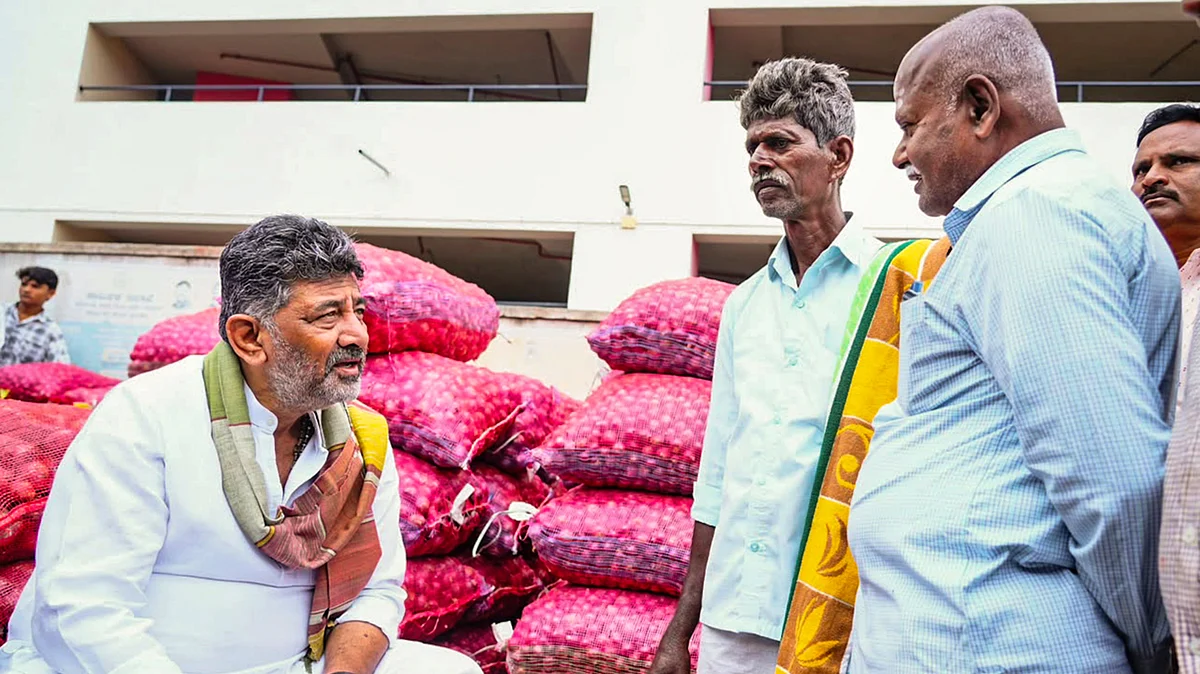 D.K. Shivakumar interacts with farmers and traders at Yeshwanthpur APMC Yard, Bengaluru, 8 Sep
