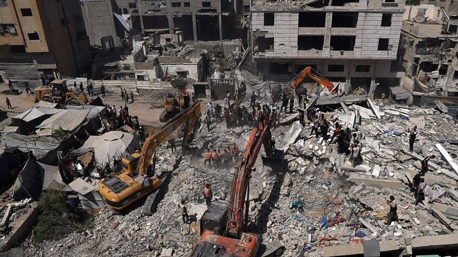 About 100 displaced people lived in the collapsed building, residents say.