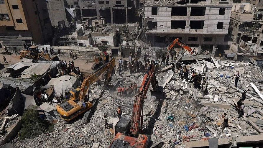 About 100 displaced people lived in the collapsed building, residents say.