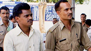 Koli being taken to a CBI court from Dasna Jail in Ghaziabad in this file image dated 12 May 2010