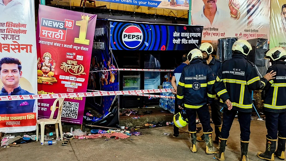 Rescue personnel stand near the sealed area after the tragedy