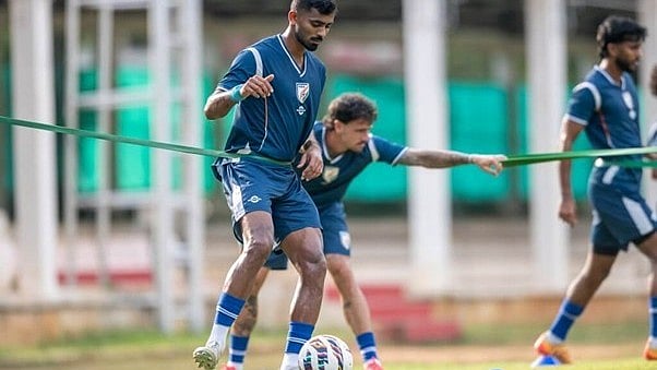 Akash Mishra undergoes a strengthening session with teammates in Bengaluru.