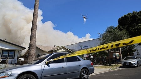 Helicopter takes part in firefighting operations to contain Dome Fire in Yosemite National Park.