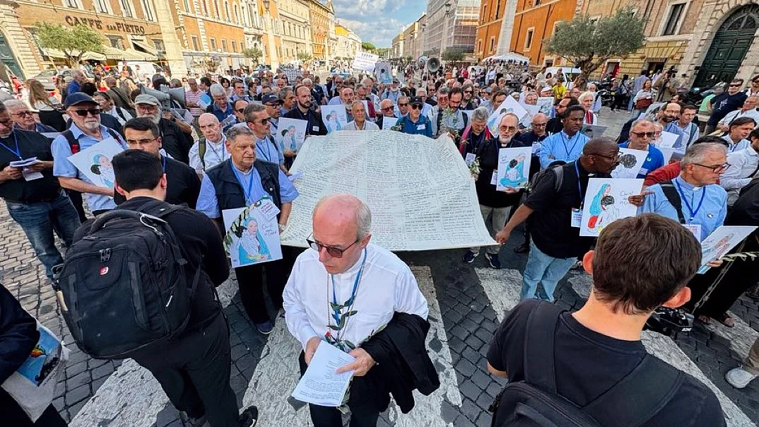 'Priests Against Genocide', an international coalition of Catholic clergy, march through Rome on 22 Sep