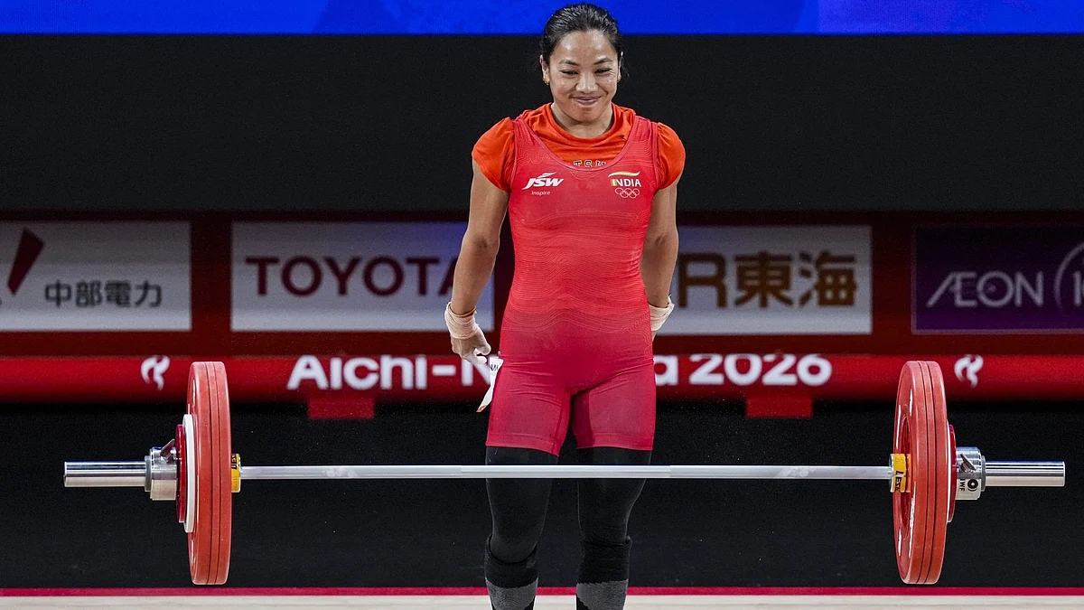 Silver lining: Mirabai Chanu on her way to a medal finish at the Asian Games.