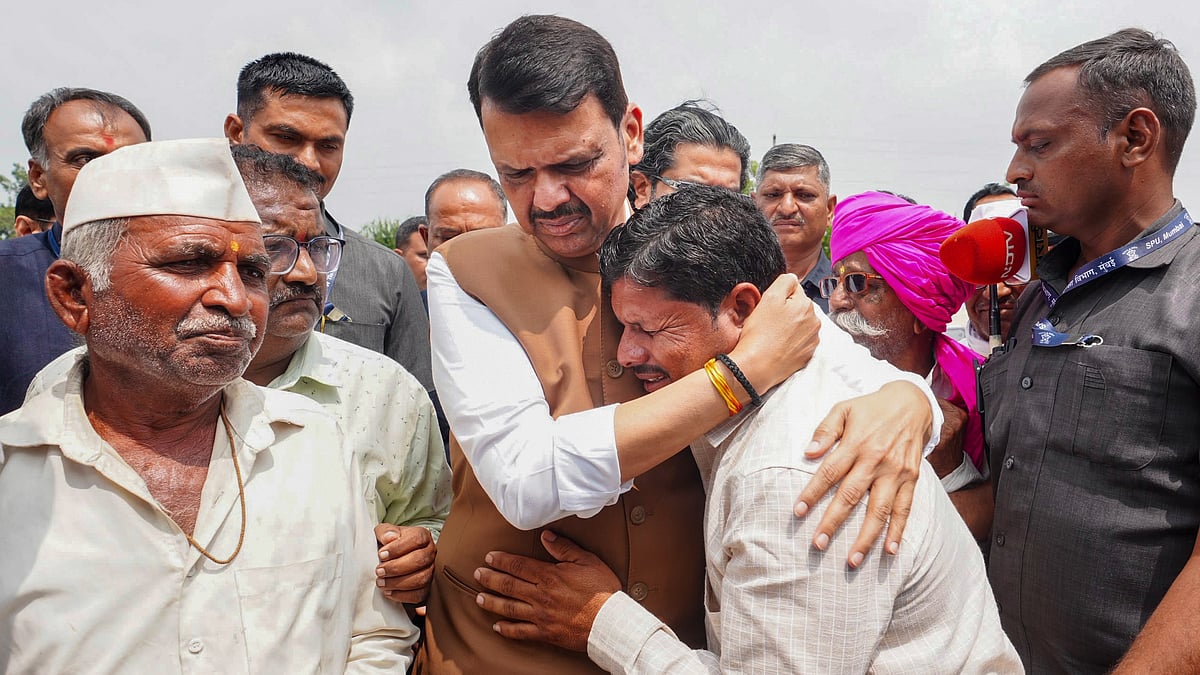 Maharashtra CM Devendra Fadnavis meets people affected by the drought in Latur district.