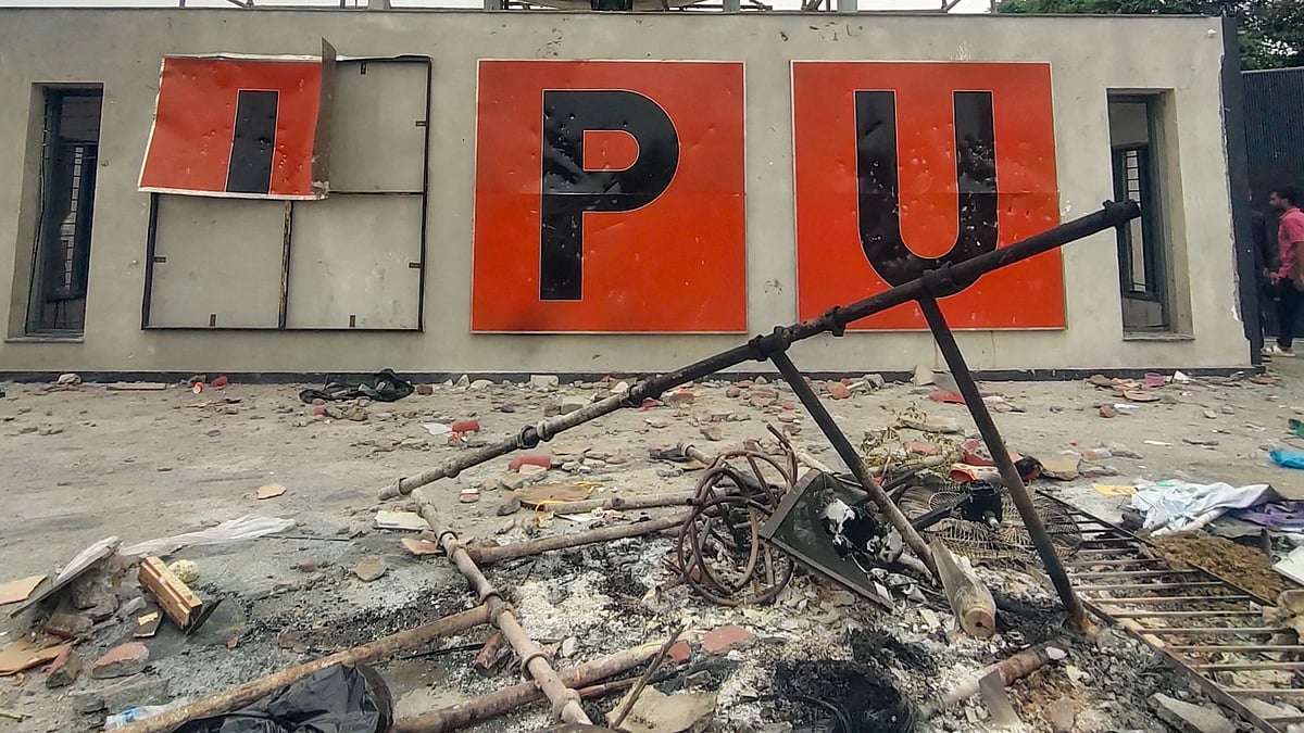Debris and charred remains after student protest at LPU campus in Phagwara.