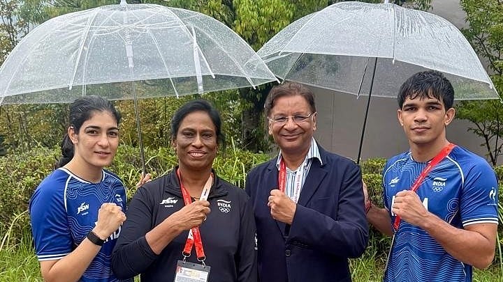 Parveen, Ankush with IOA president P.T. Usha and Ajay Singh, president of BFI