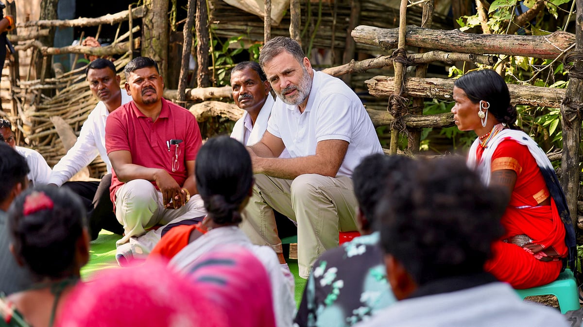 Rahul Gandhi interacts with tribal families affected by malnutrition and disease outbreaks.