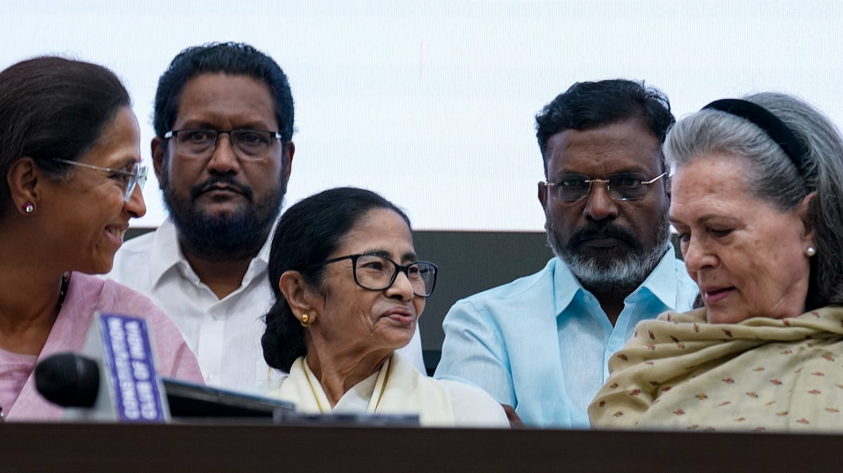 Sonia Gandhi, Mamata Banerjee, Supriya Sule and others during a press conference in New Delhi.