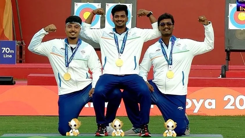Sahil (centre), Kushal Dalal and Ganesh Mani Ratnam Thirumuru celebrate their golden moment.