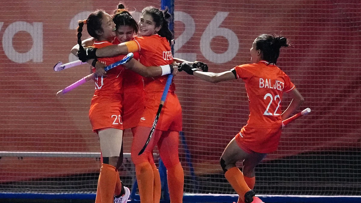 Lalremisami (L) celebrates after scoring in Gifu, Japan 2 Oct