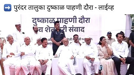 Pawar (seated, C) said inadequate rainfall threatens standing crops