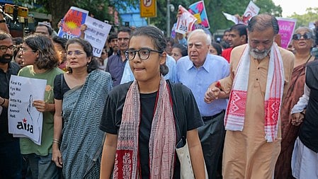 Neha Bora along with Kapil Sibal and Yogendra Yadav among others