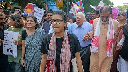 Neha Bora along with Kapil Sibal and Yogendra Yadav among others