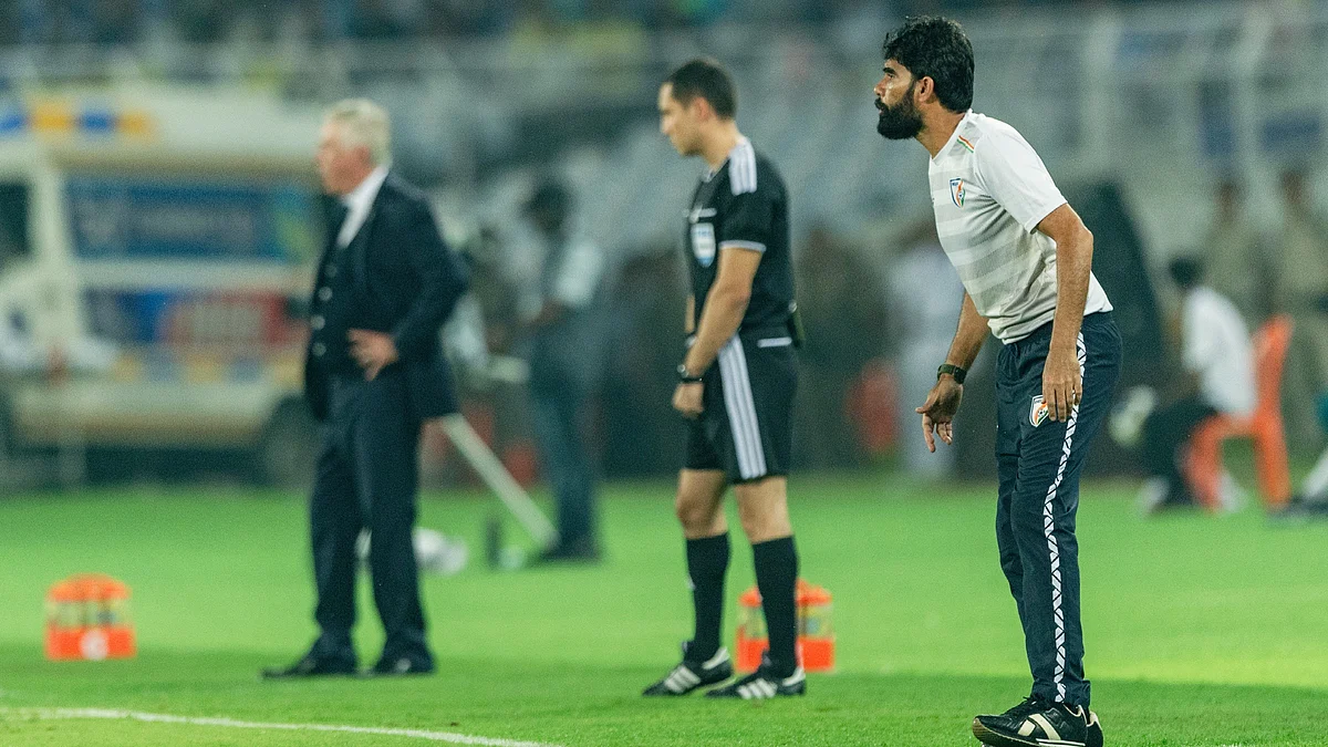 Battle of inequals: Khalid Jamil (R) and Carlo Ancelotti at the touchline during Sunday's game