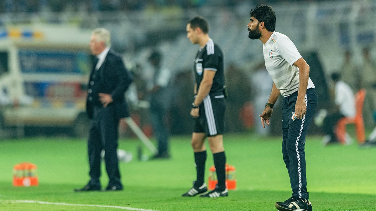 Battle of inequals: Khalid Jamil (R) and Carlo Ancelotti at the touchline during Sunday's game