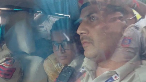 Bora was taken away in a car occupied by male police. 