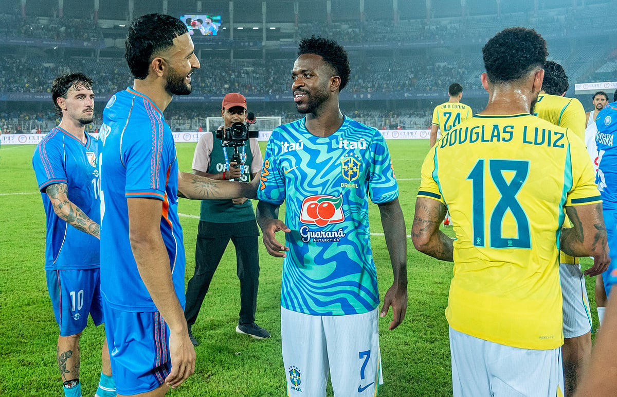 (L) Ryan Williams, Manvir Singh with Vinicius jr after the match