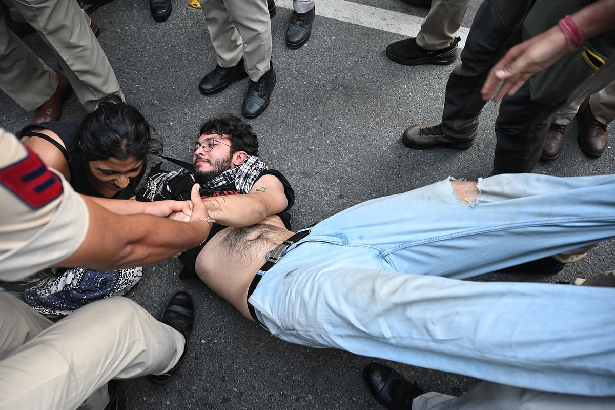 Protest turns more chaotic as small groups clash with police personnel.