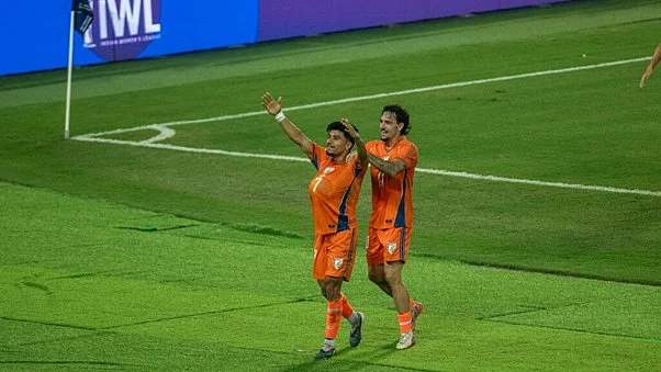 Anirudh Thapa celebrates his equaliser against Uruguay as teammate Ryan Williams joins him