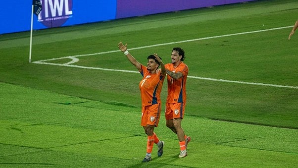 Anirudh Thapa celebrates his equaliser against Uruguay as teammate Ryan Williams joins him
