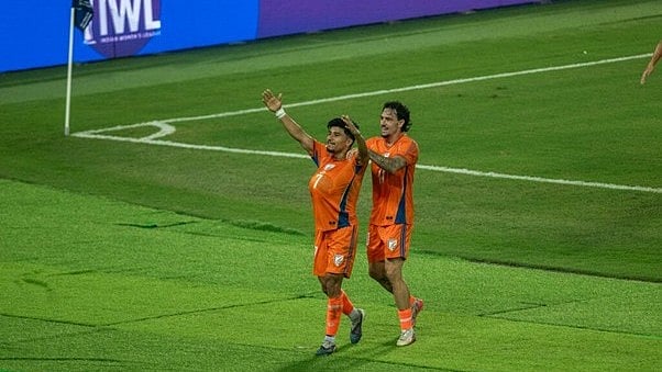 Anirudh Thapa celebrates his equaliser against Uruguay with Ryan Williams.