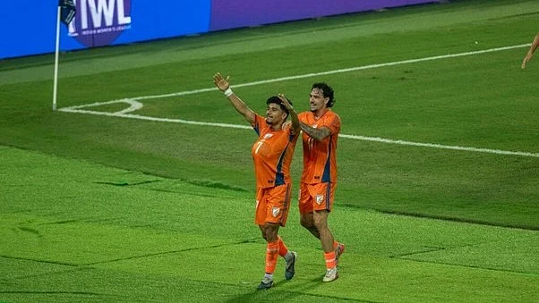 Anirudh Thapa celebrates his equaliser against Uruguay with Ryan Williams.