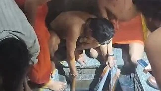 Rescuers try to pull out a student from water tank in Mathura.
