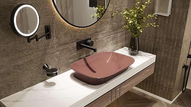 A washbasin becomes the visual anchor around which the rest of the design is built. 