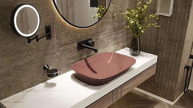 A washbasin becomes the visual anchor around which the rest of the design is built. 