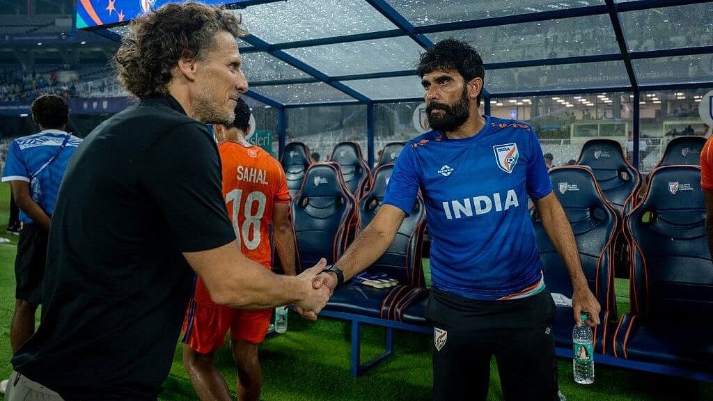 Diego Forlan with Khalid Jamil after India's 6-1 defeat