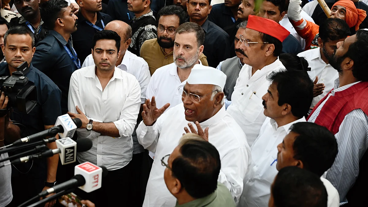 Mallikarjun Kharge (C), Rahul Gandhi and other INDIA bloc leaders before heading out to Rajghat